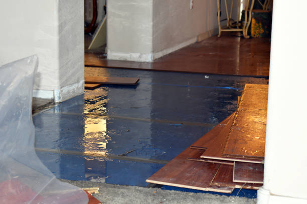 Professional Flood Damage Repair technician working in Skowhegan, ME